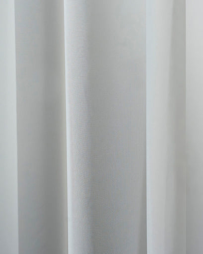 Close-up of light grey Scottish custom outdoor sheer curtain fabric with fine mesh texture and soft vertical folds.