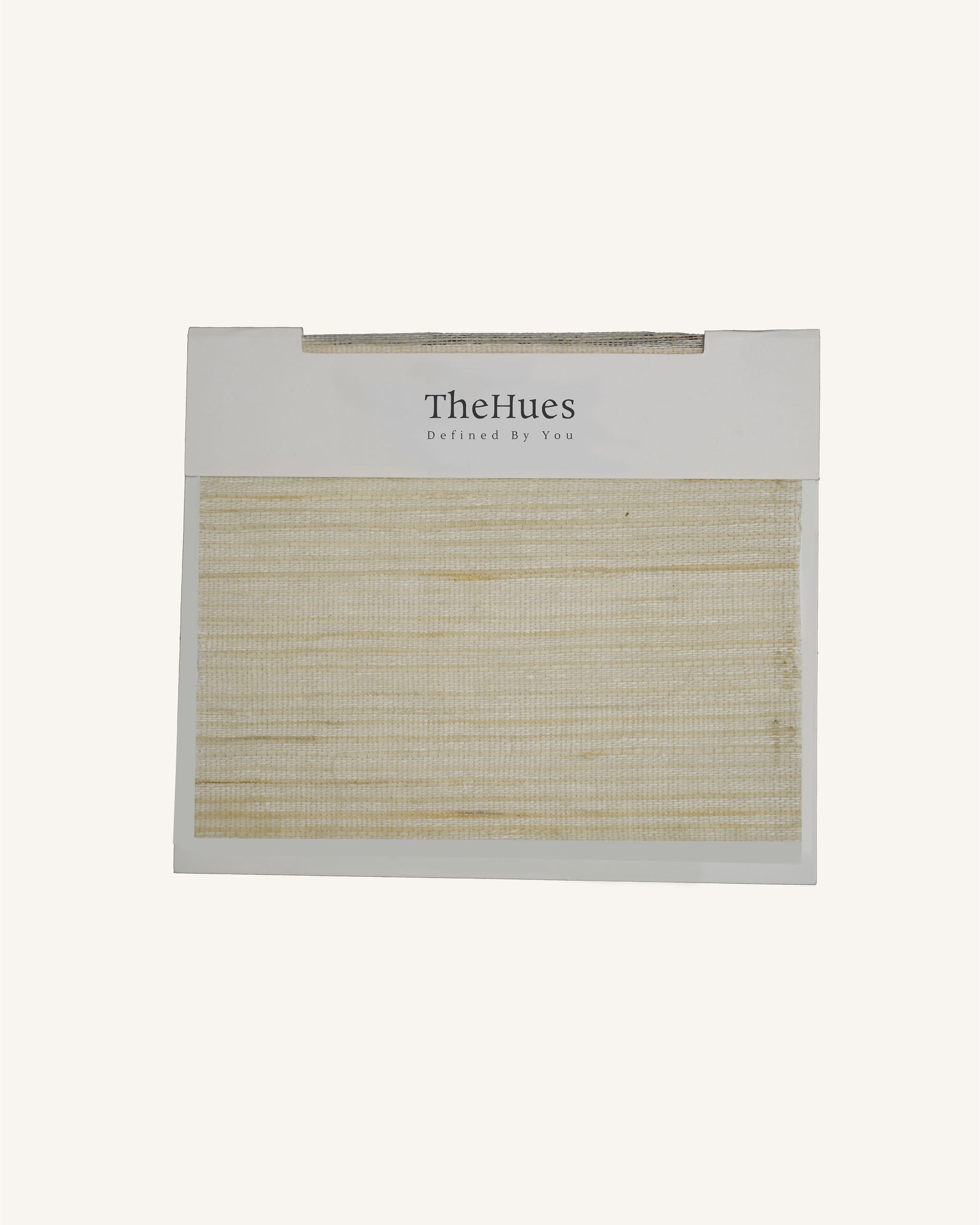 TheHues Yuki Linen Woven Shade Fabric swatch for custom window treatments, showcasing light, textured weave and natural white tone.