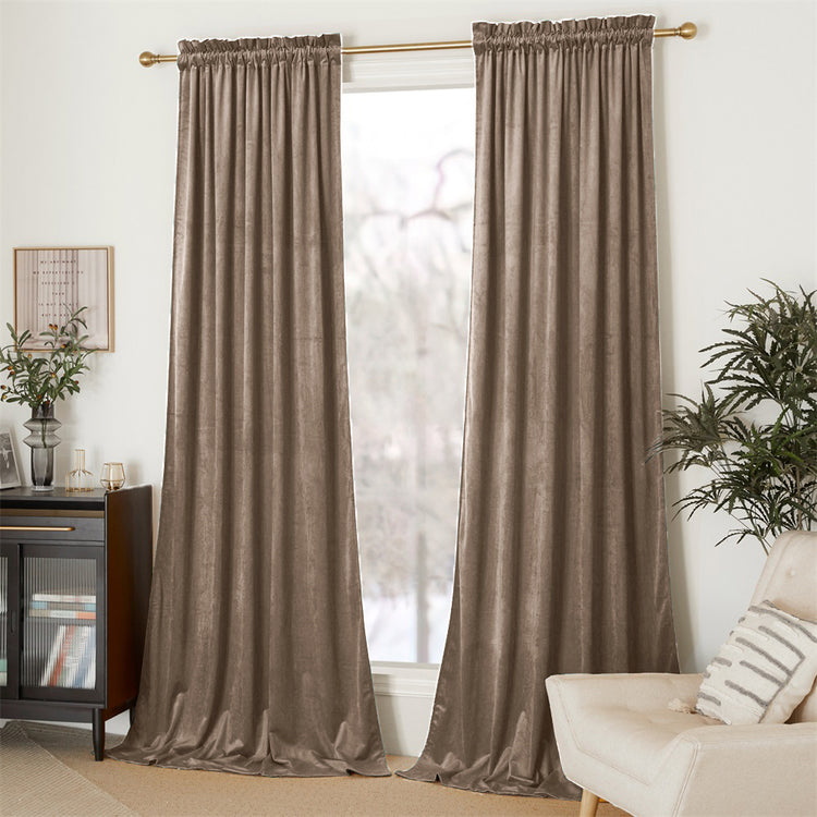 Luxurious taupe velvet custom curtains, full-length with a gathered header, perfectly balancing privacy and sophisticated home decor.