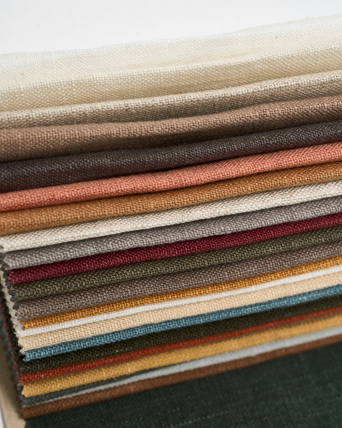 Textured Helena 100% pure linen fabric swatches in 25 colors for custom window treatments and made-to-measure drapery.