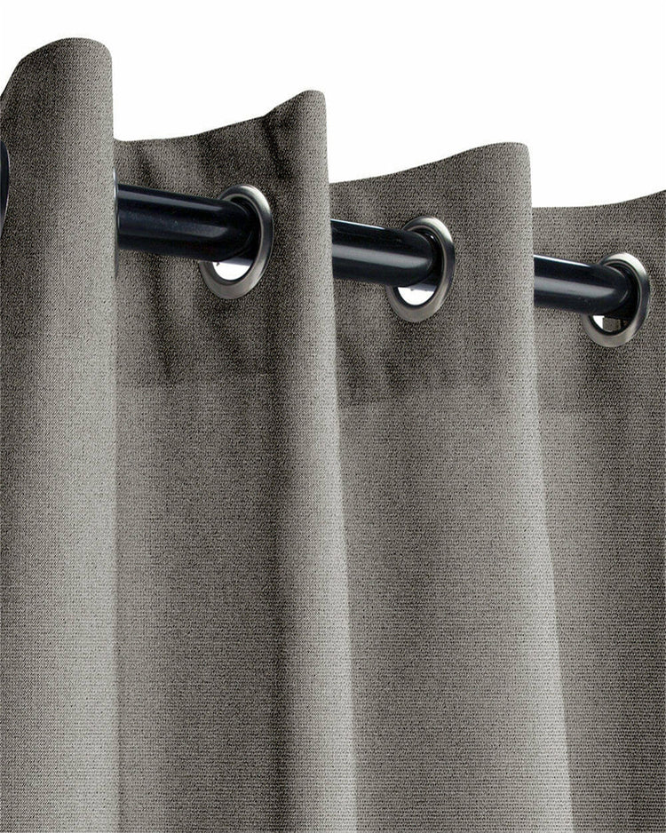Close-up of a grey FadeShield Pro™ custom outdoor curtain. Textured, fade-resistant, waterproof fabric with sleek grommet top on a black rod.