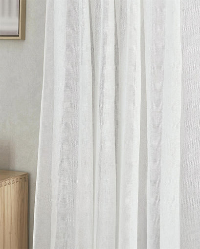 Close-up of Wengen custom linen & cotton blend airy sheer curtain, revealing its delicate, breathable weave and graceful folds.