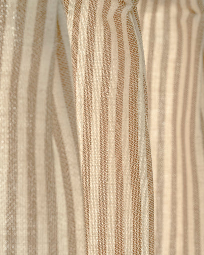Detailed view of Milo linen blend striped cafe curtain fabric, showcasing textured natural cream and tan vertical stripes.