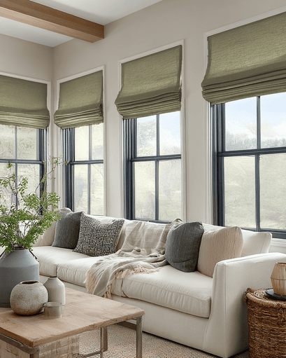 Modern living room with three custom olive green Zoe Flat Fold Linen Look Roman Shades, balancing privacy and natural light.